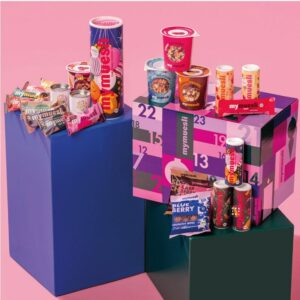 coffret rectangle violet calendrier de l'avent mymuesli snack 2024 contenant 24 muesli, barre céréales, chocolats...