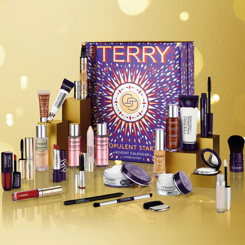 coffret beauté luxe violet calendrier de l'avent by terry 2023 contenant 24 essentiels maquillage et soin d'une valeur de 578 euros mascara, baume, serum