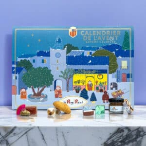 Coffret gourmand gourmand calendrier de l'Avent le Roy René 2024 avec 24 surprises sucrées pour attendre Noel : calisson; nougat; pate à tartiner ou encore confiture et amande chocolat