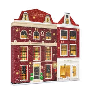 Calendrier de l'avent Rituals 2024 version classique représentant la boutique House of rituals contenant 24 produits de beauté soins corps et des bougies