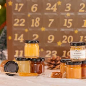 calendrier de l'avent miel Apisphère 2024 contenant 24 pots de miels et bonbons